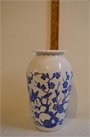 Ceramic vase with blue flowers and birds
