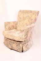 UPHOLSTERED SWIVEL ARM CHAIR WITH WOODEN BASE