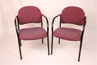TWO BURGUNDY UPHOLSTERED OFFICE CHAIRS