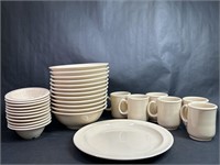 Collection Of Cream Colored Dishware