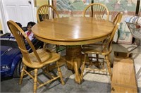 Gorgeous oak wood dining table with four
