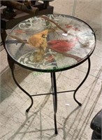 Glass top metal accent table with cardinal