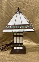 Stained glass style table lamp with metal base,