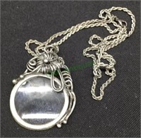 Unique nickel finish metal magnifying pendant