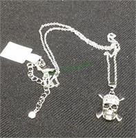 New silver tone necklace with skull and