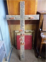 wooden cross with candle holders