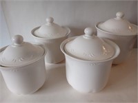 Four Porcelain Canisters By: Pfaltzgraff