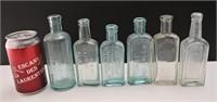 6 antiques bouteilles de médicaments