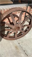 Cast iron tractor wheel, 24 in, has chip out