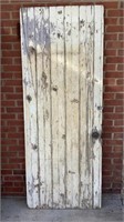Antique wood door with hardware, back has cross
