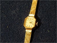 Caravelle Gold Tone Slim Ladies Watch
