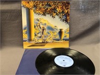 THE MOODY BLUES. THE PRESENT VINYL ALBUM.