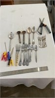 Various silverware, scissors.