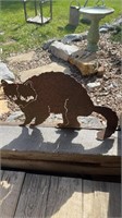 Large laser cut iron raccoon figure, with a