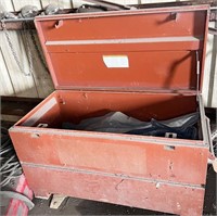 metal job box with welding clothing contents