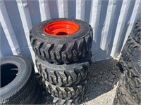 (4) 12-16.5 Skid Steer Tires on Orange Wheels
