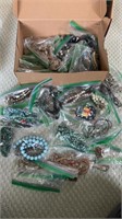 Shoebox of beaded necklaces, costume, and better