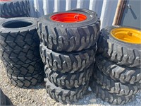 12-16.5 Skid Steer Tires on Orange Wheels
