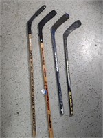 (4) Hockey Sticks