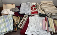 Table cloths, placemats, cloth napkins and rings,