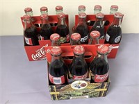 Collectors Coca-Cola Bottles and Carriers