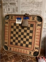 Carom board, and game pieces