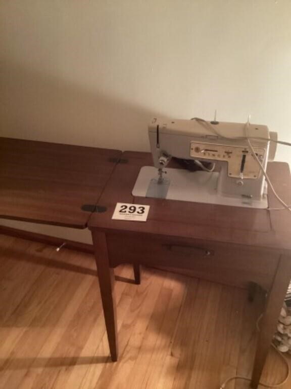 Singer, sewing machine in cabinet