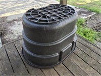 Black plastic outdoor tub