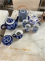 Blue and white teapots and cups