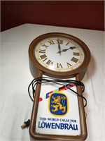 1987  21" LowenBrau Lighted Clock