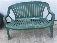 Green plastic bench