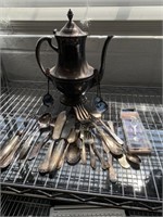 Tea pot and silverware