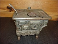 vintage crescent cast iron stove with extras