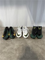 3 Pairs of new Packer pro shop cleats, unworn.