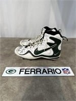 Player worn hightop cleats by Bill Ferrario and