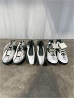 3 Pairs of Packer used signed cleats.