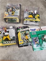 Aaron Rodgers figurines and 1996 Starting