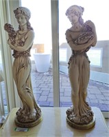 Pair of Composition figural lady figurines. 27"