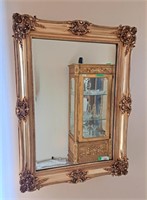 Baroque gilt wall mirror. 33" l x 45" h
