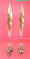 Pair of glass candle sticks with gold candles and