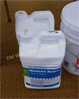 Jugs of Mortar Admix (#923)