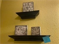 2 shelves with 3 fun signs