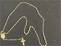 Rosary beads chain is marked 14 karat