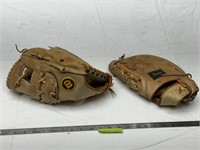 Baseball gloves.