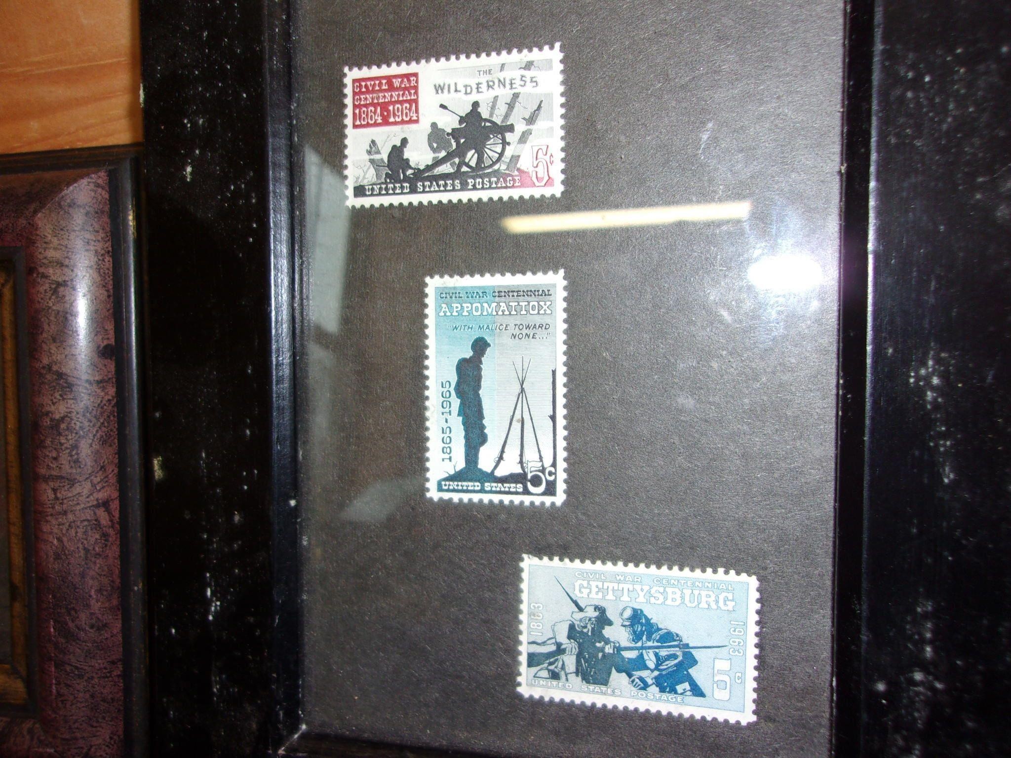 old framed military stamps from collector