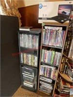 Assorted Dvds, Player, Shelves