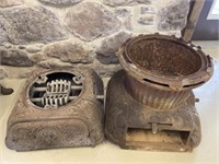 (2) Bottoms of Cast Iron Parlor Stoves