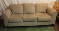 Three cushioned sofa, grey in colour