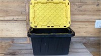Small plastic container with lid