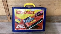 Matchbox case with assortment of cars